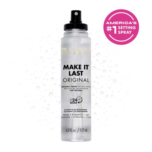 Valkoinen suihkepullo mustalla kannella ja kultaisella tekstillä, merkitty 'Make It Last Original' ja 'America's #1 Setting Spray'.