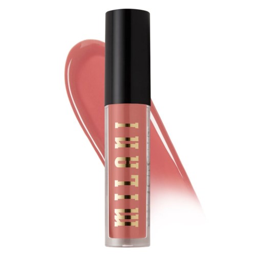 A lip gloss tube with pink color, black cap, and gold writing, placed on a matching pink smudge.
