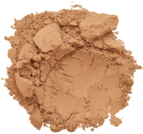 Lös, ljusbrun pulver med några större bitar, ser ut som makeup eller lera.
