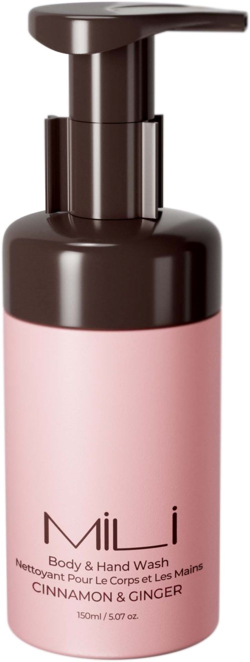 Pink bottle with black pump, labeled 'Mili', with cinnamon and ginger scent, 150ml size.