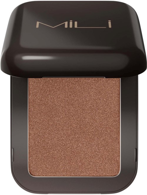 En kompakt makeupprodukt med bronston, i ett svart skal med varumärket "MILL" på toppen.