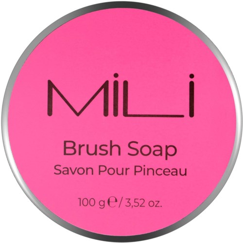 En rund pink label med sort og hvid tekst til MILLI børste sæbe, 100 gram, med produktnavn, beskrivelse og vægt.