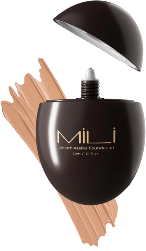 Musta, munakoison muotoinen pullo, jossa lukee 'MiLi Dream Atelier Foundation' ja osa meikkivoiteesta näkyy.