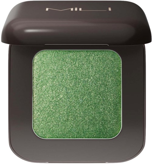 Ein schwarzes quadratisches Make-up-Produkt mit grünem Lidschatten in der Mitte und schwarzem Deckel.