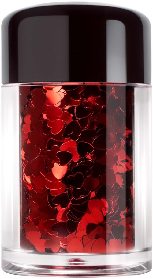 A small jar filled with shiny red heart-shaped confetti and a black lid on top.