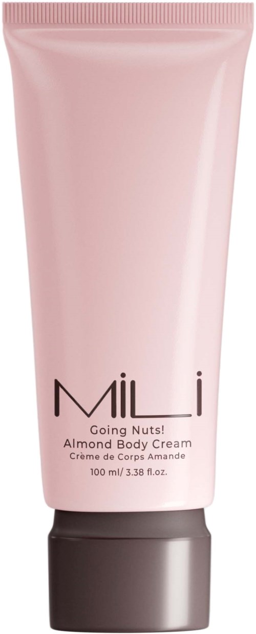 Pink tube of Almond Body Cream with black cap, labeled 'MILK Going Nuts!'.
