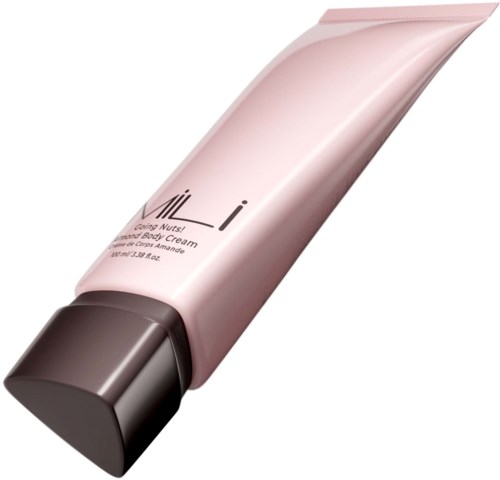 A pink and gray tube of body cream with a curved shape and text on it.
