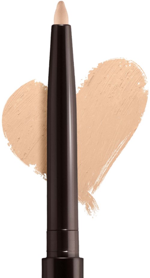 En beige-färgad concealerpennor med svart lock, placerad framför en beige hjärta bakgrund.