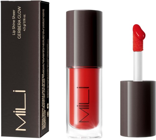En rød leppglans med svart lokk, i en eske merket "Milani" og "Lip Shine Sheer Glow."