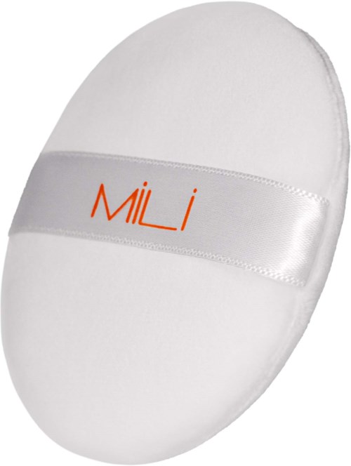 Ein weißes ovales Objekt mit einem Satinband in der Mitte, das das Wort 'MİLİ' in Orange zeigt. Es sieht aus wie ein Kosmetik- oder Hautpflegeprodukt.