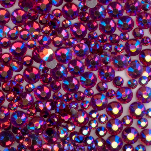 Small, shiny pink and purple rhinestones covering the surface in a scattered pattern.