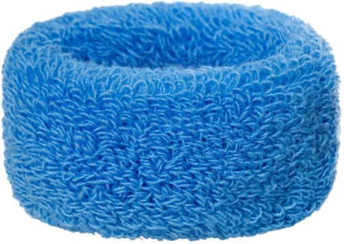 En fluffig, mjuk blå handduk rullad i en cirkelform.