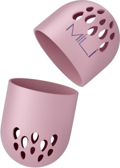 Pink silicone container with holes, labeled "Mili". It appears to be a kitchen or bathroom cup holder or organizer.