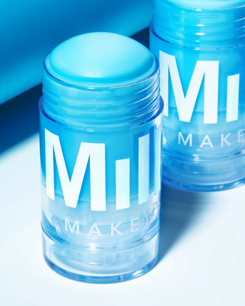 Two clear containers with blue lids and bold white and blue text. They are likely cosmetic or skincare products.