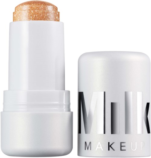 A white tube of highlighter with a beige cap, labeled 'Milky Makeup' on the cap.