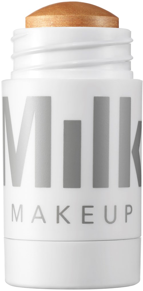 Ein weißer Stick mit dem Wort 'Milk' und 'Makeup', oben ein brauner Makeup-Stick.