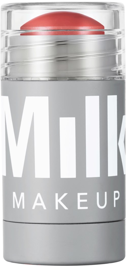 Huulipuna kirkkaassa astiassa, jossa lukee 'Milk Makeup'.
