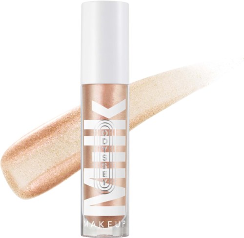 Vaseline makeup highlighter-stift med beige glød, står oppreist, hvit bakgrunn og en gullskimmer.