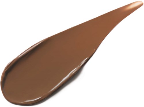 A chocolate spread or sauce with a shiny, smooth surface and a slightly elongated, curved shape.