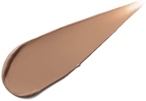 A teardrop-shaped smear of beige-colored makeup or foundation.