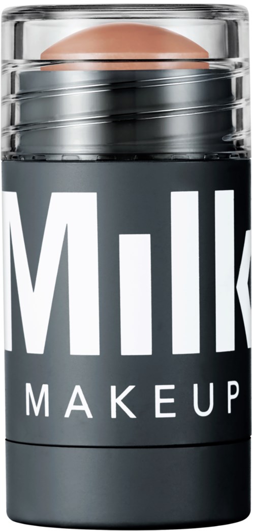 En makeup-beholder merket "Milk Makeup" med en rund topp og delvis synlig stor tekst.