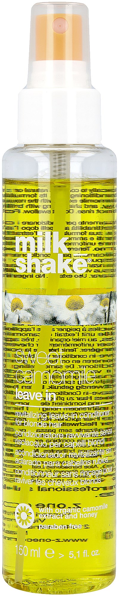 En gul sprayflaska märkt 'milk shake' med liten text, ett genomskinligt lock och ett sprutmunstycke.