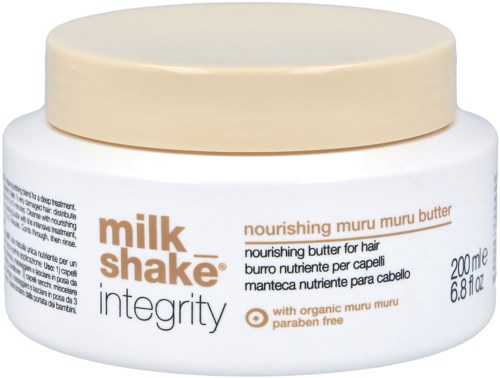 En vit burk med beige lock innehåller Milk Shake integrity näringsrik muru muru smör för hår. Etiketten är på flera språk.