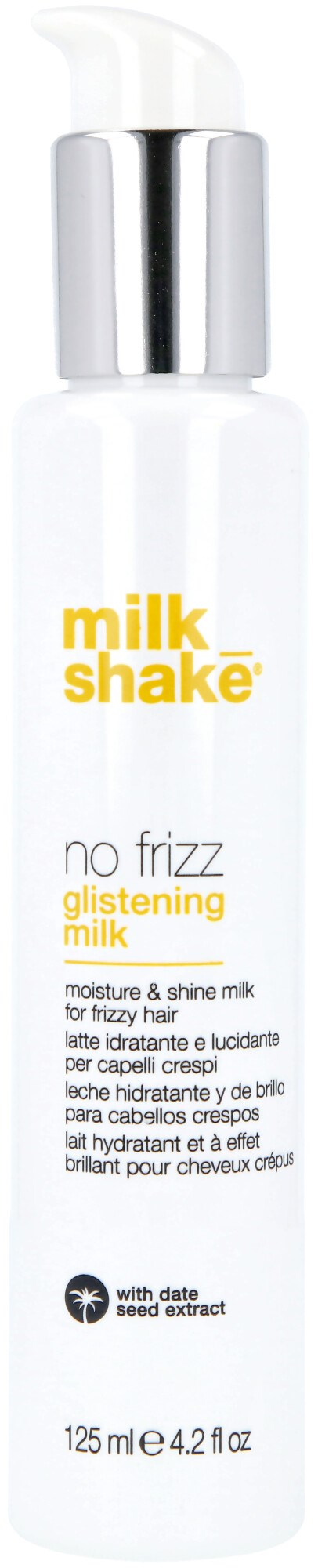 En vit flaska med pump, märkt 'milk shake' och 'no frizz', avsedd för hårfukt och glans.