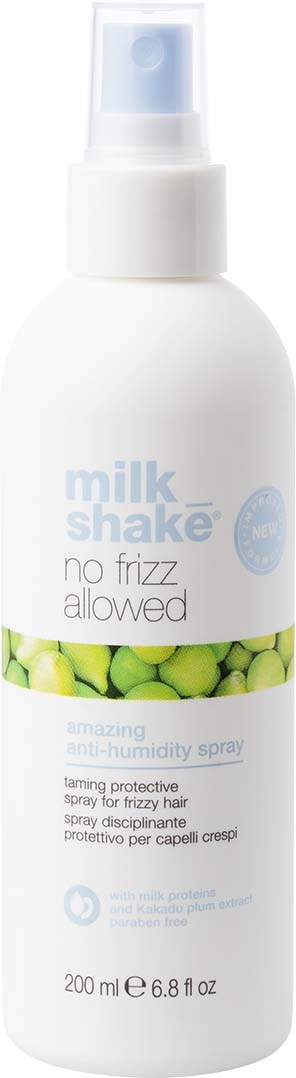 Valkoinen suihkepullo merkitty 'milk shake no frizz allowed' hiuksille, vihreitä herneitä kuva, 200ml.