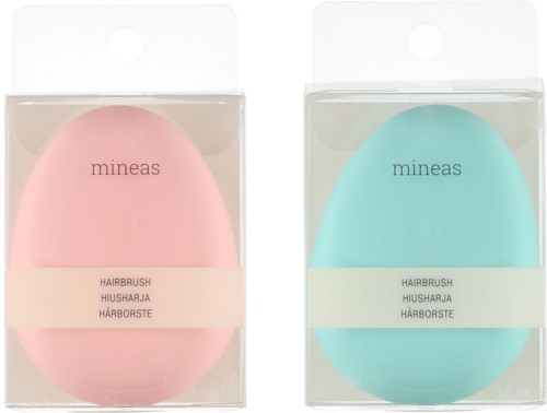 Två pastellfärgade äggformade borstar i rosa och blå, märkta 'mineas' och 'HAIRBRUSH' med annan text.