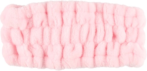 Een zachte, roze, fluffige hoofdband met geribbelde textuur, waarschijnlijk voor haar of schoonheidszorg.