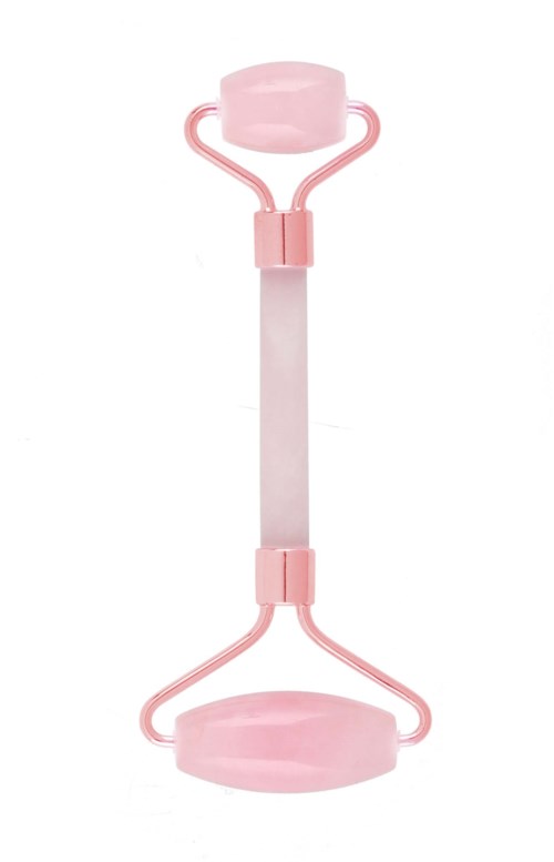 En rosa massasjerulle med to runde ender koblet sammen med et håndtak. Den brukes til hudpleie eller muskelavslapning.