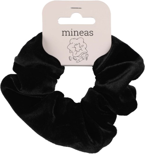 Ein schwarzes Samt-Haarband mit einem weißen Etikett, das den Markennamen 'mineas' und ein Blumenlogo zeigt.