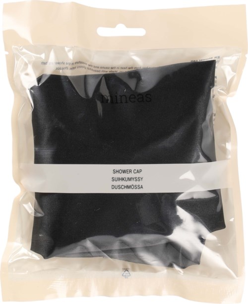 En svart duschmössa i tydlig plastförpackning med tryckta textetiketter.
