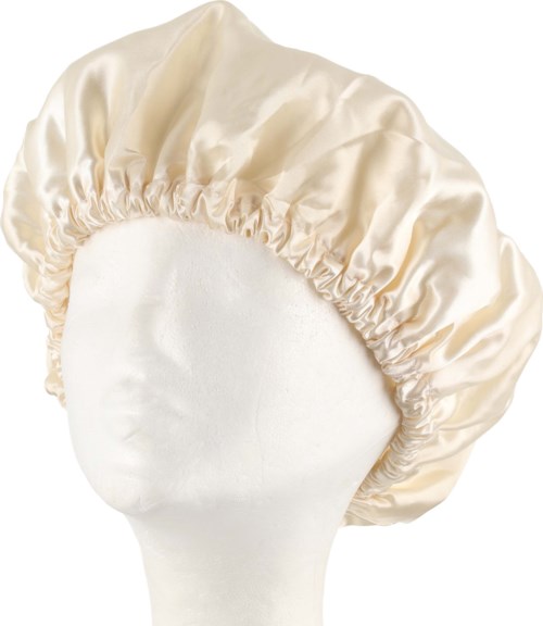 A beige satin bonnet with ruffled edges, displayed on a white mannequin head.