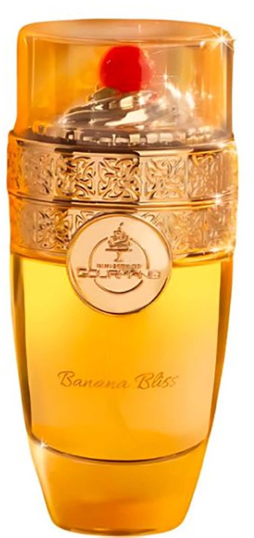 Żółta butelka perfum z czerwonym wiśniowym ozdobnym elementem na szczycie i złotymi zdobieniami, oznaczona Banana Bliss.