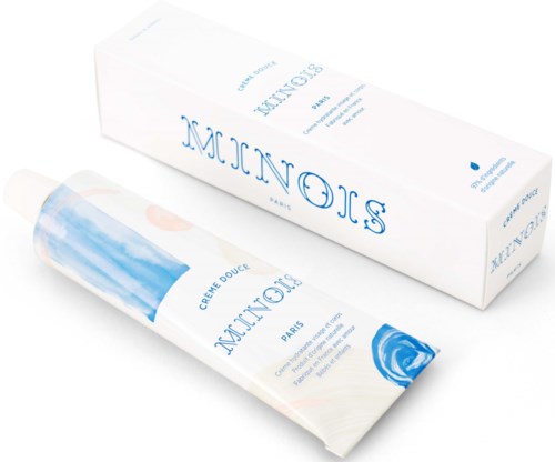 A tube of soft cream with blue and white packaging, alongside a white box with blue text.