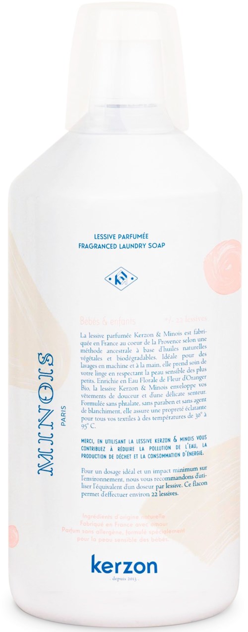 White bottle with blue and pink text, and a pink circle. It is laundry soap for fragrant washing.