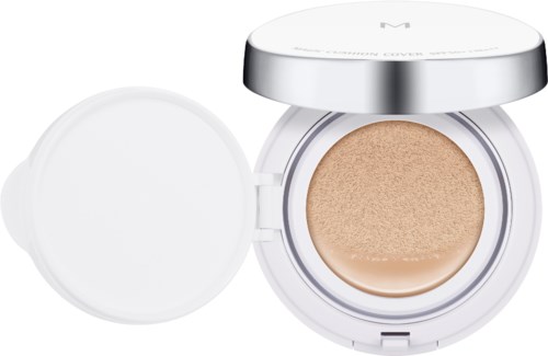 En öppen makeup-svamp i ett vitt runt case med ett silverlock.