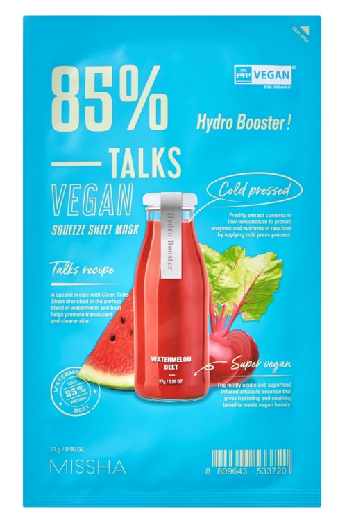 Ett blått paket som annonserar en vegansk mask med vattenmelon och rödbeta, med 85% naturligt innehåll, kallpressad.