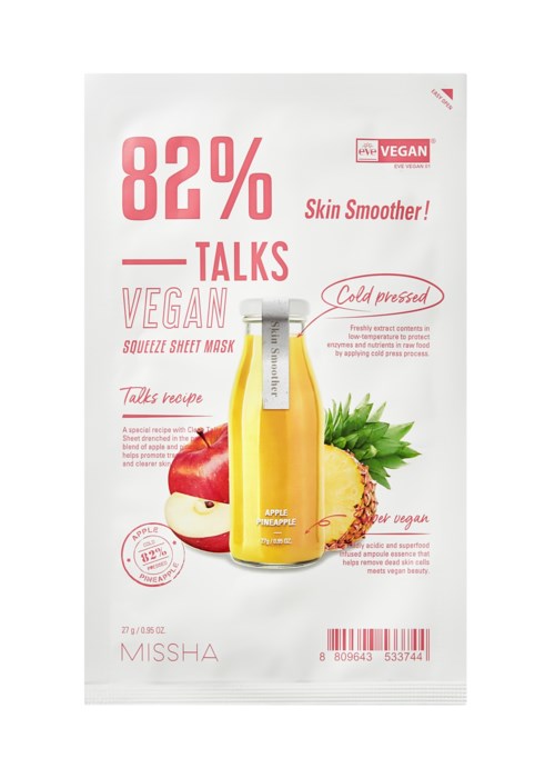 Veganansiktsmask paket med banan, äpple och blad, som främjar hudens slätare och kallpressade ingredienser.