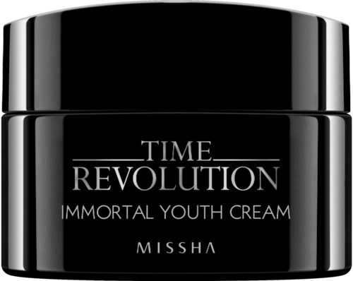 En svart burk av Missha Time Revolution Immortal Youth Cream med vit text.