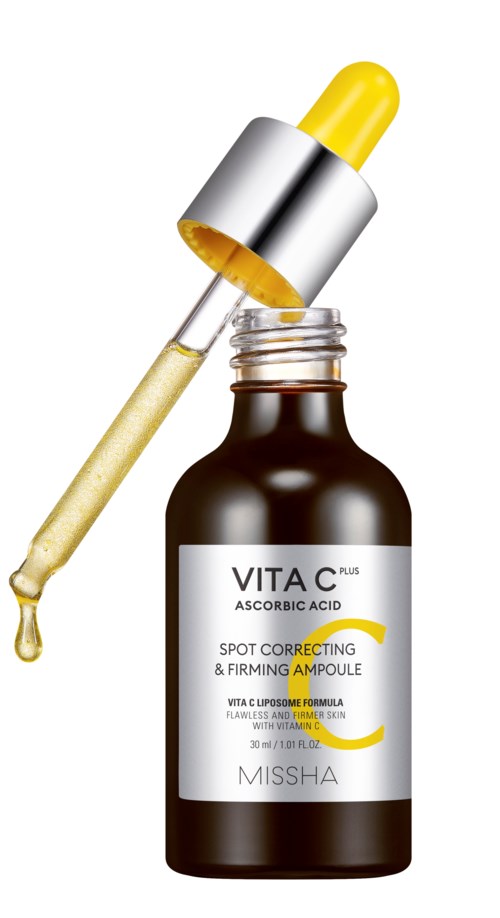Eine braune Flasche mit Tropfer, gekennzeichnet als Vitamin C-Serum für Hautpflege. Tropfer hat einen gelben Deckel und Flüssigkeit.