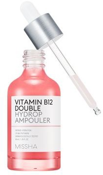En rosa vätska för Vitamin B12 i en liten flaska med pipett för applicering.