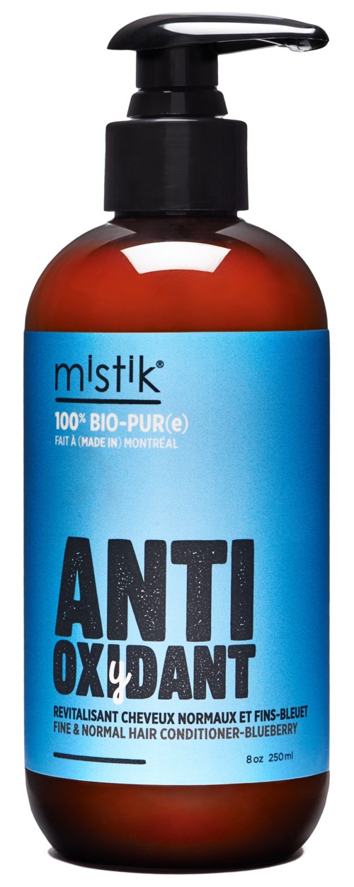 En brun flaske med blå etikett og pump, kalt 'ANTI OXIDANT', for hårpleie med blåbær ekstrakt.