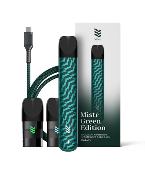 Vape-enhet med Mistr Green Edition, grønn og svart design, to svarte munnstykker, en eske og en grønn inhalator.