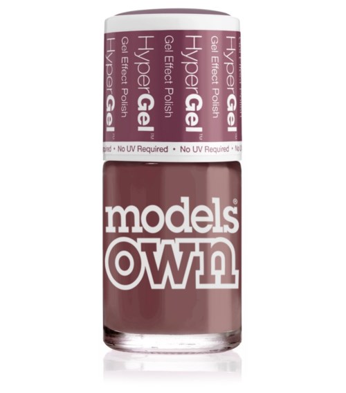 En flaska av Models Own Hyper Gel nagellack i en ljuslila färg med vit lock.