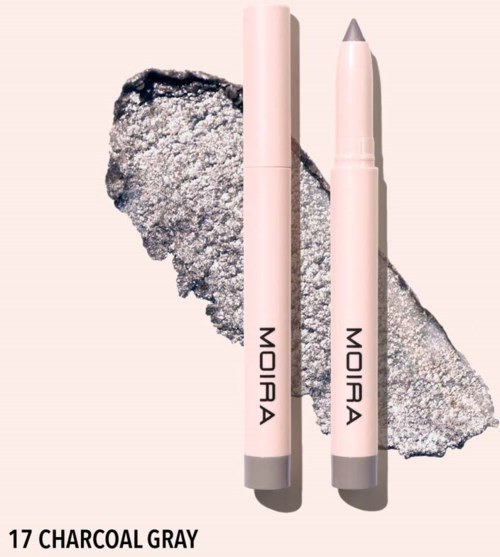 Two pink makeup sticks with black text on a grey and black textured background. One stick has a cap, the other is open.