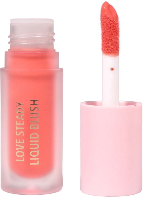 A pink lip gloss tube with a sponge applicator and liquid blush label on the side.