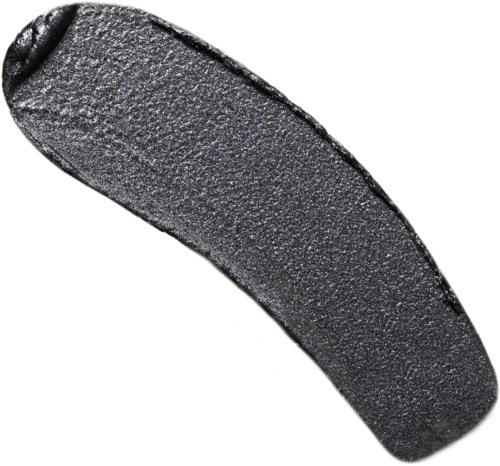 Een donker, getextureerd object met een gebogen vorm, lijkt op een steen of rubberstuk.